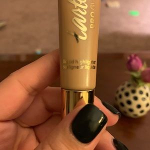 Tarte Tarteist liquid highlighter in exposed.